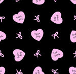 粉色爱心蝴蝶结黑色背景图