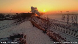 此为航拍雪后的蒸汽机车素材