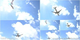 飞机掠过头顶天空