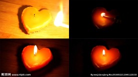 点燃心形蜡烛实拍视频素材