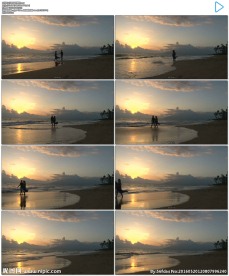 夕阳大海沙滩情侣