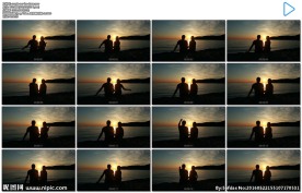 夕阳海滩情侣剪影