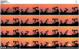 日出红日下的石油钻井