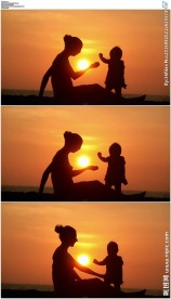唯美温馨海滩夕阳下的母子