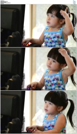 可爱小女孩玩电脑上网