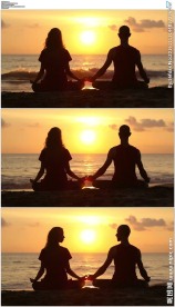 情侣夫妇坐在海边练瑜伽