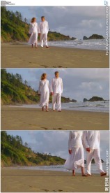 老年人手牵手行走在海滩上