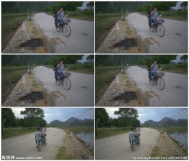 越南街道上骑着自行车的儿童