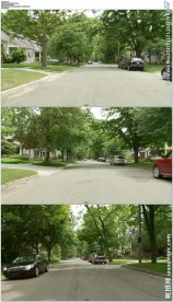 在郊区道路上行驶后视图