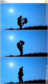 蓝天下的父子剪影