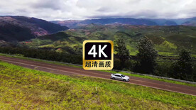航拍汽车在山区道路行驶
