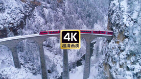 短视频素材红色列车穿越雪域隧道